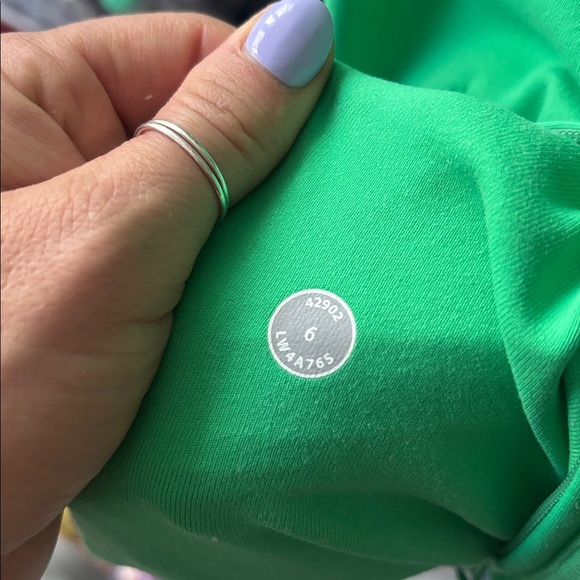This is a Lululemon Om Me Home yoga jacket in green Luon fabric. - Picture 8 of 8